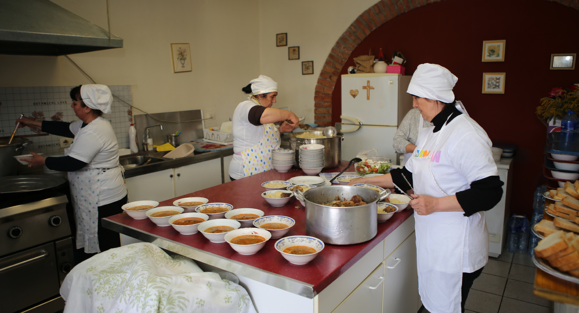 Staff prepare hundreds of meals to feed those in need every day