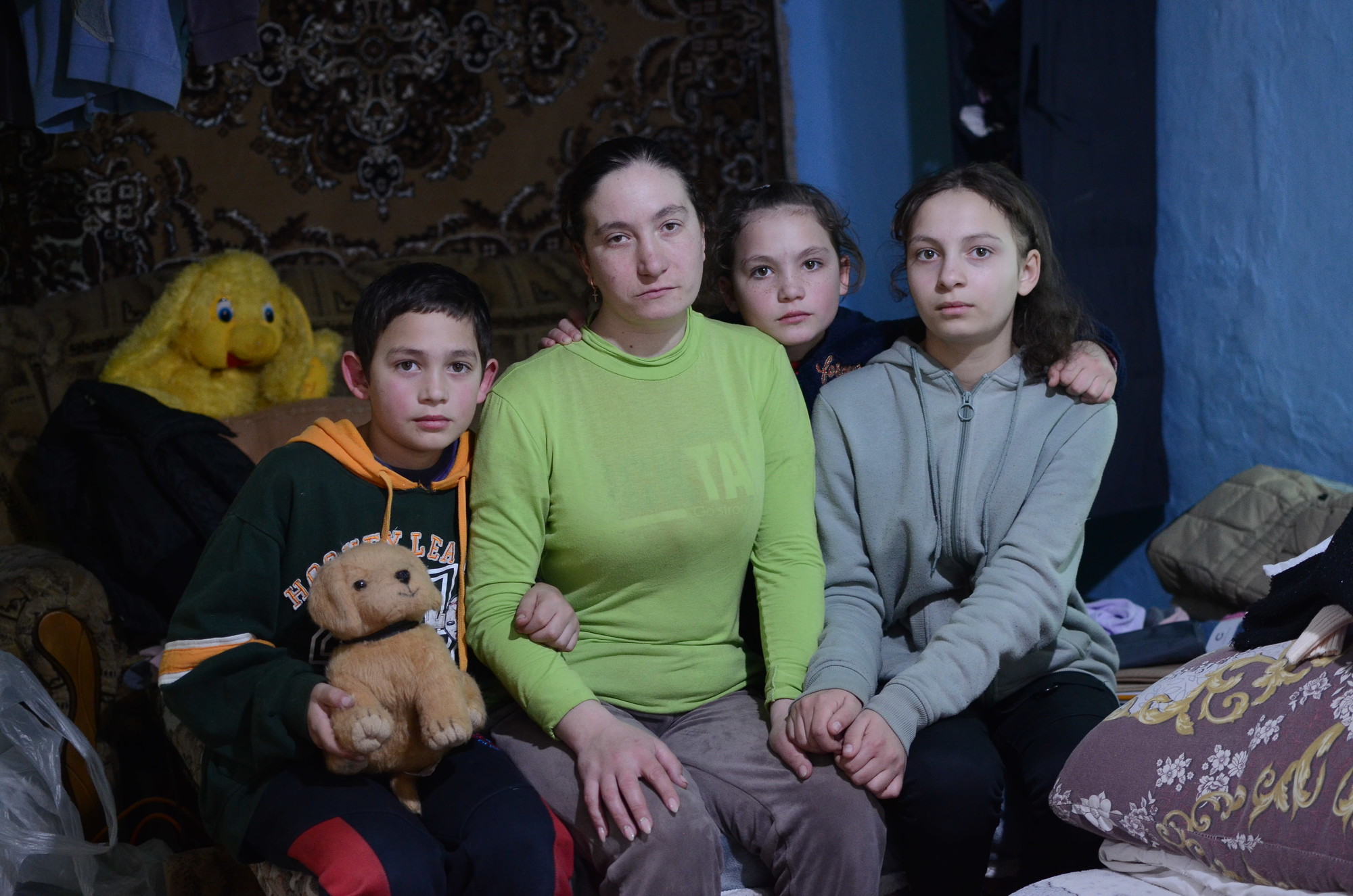 Claudia and her family at home in Moldova