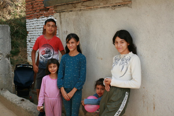 Isus with four of his sisters at home in Bulgaria